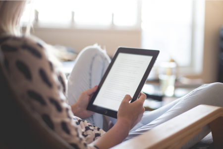 Person reading an electronic book
